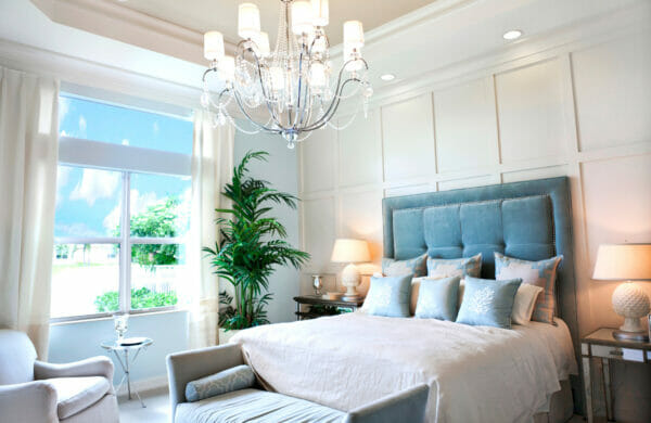 Beautiful Florida bedroom with light blue accents